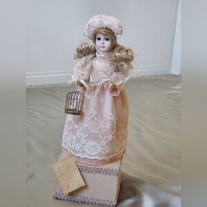Rare Vintage Happyland Doll holding BirdCage With  Musical  Box